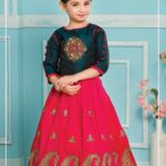 Girls' Luxury Festive Lehenga Set – Dark Teal Green Choli with Zari Embroidery & Flared Pink Skirt with Gold Paisley Border